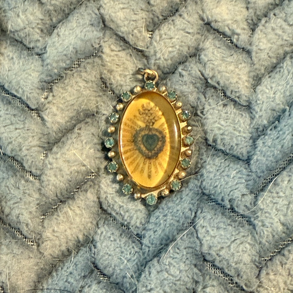 Virgin saints and angels pendant